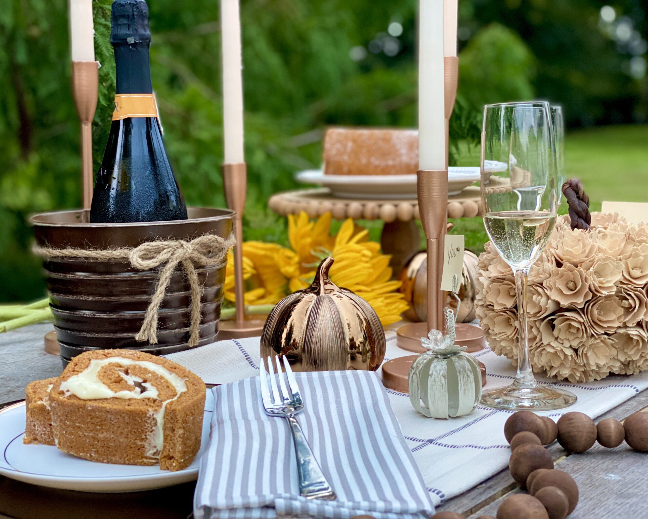 Fall table outdoor, pumpkin roll, pumpkins, wine, table cloth