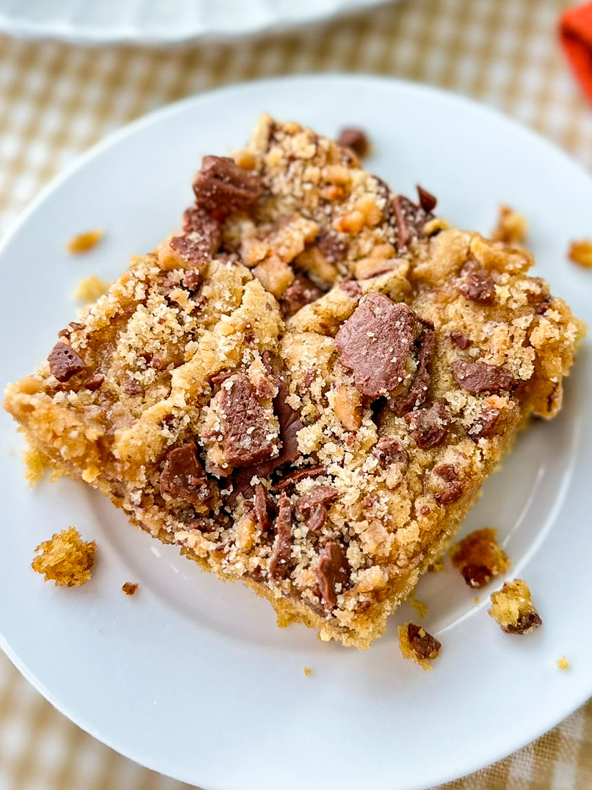 Toffee Coffee cake piece sitting on white plate